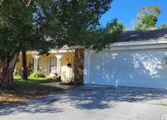 Property at 12303 Partridge Hill Row, Hudson, FL, 34667, 3 beds, 2 baths, [object Object]