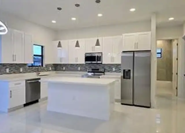 Property at 2604 26th St SW, Lehigh Acres, FL, 33976, 3 beds, 2 baths, [object Object]
