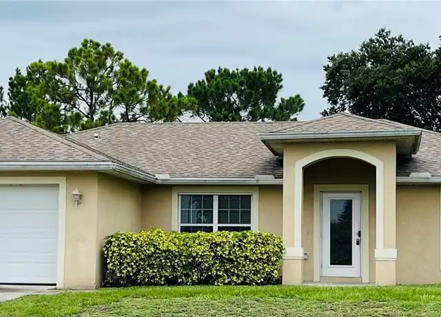 Property at 3014 30th St SW, Lehigh Acres, FL, 33976, 3 beds, 2 baths, [object Object]