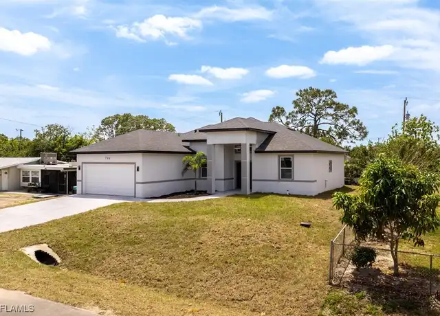 Property at 706 Coolidge Ave, Lehigh Acres, FL, 33936, 3 beds, 2 baths, [object Object]