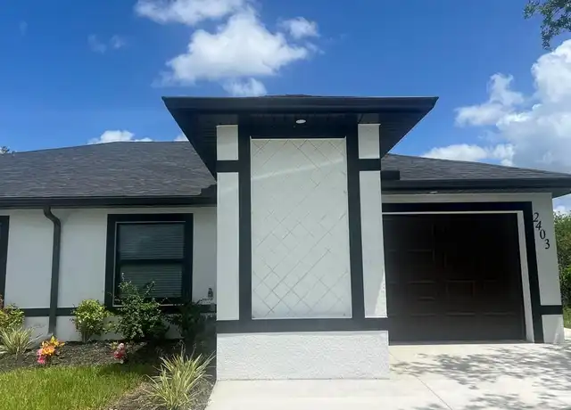 Property at 2403 Dogwood Ave N, Lehigh Acres, FL, 33971, 3 beds, 2 baths, [object Object]