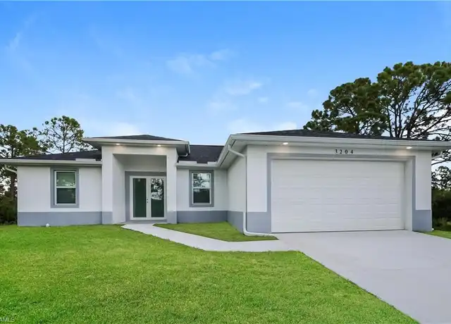 Property at 3204 66th St W, Lehigh Acres, FL, 33971, 3 beds, 2 baths, [object Object]