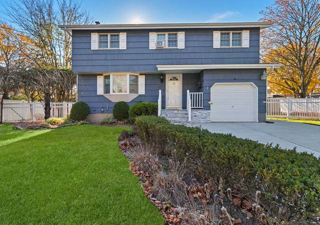 Property at 164 Colonial Springs Rd, Wheatley Heights, NY 11798, 4 beds, 4 baths