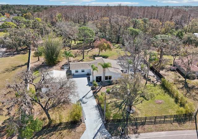 Property at 8376 Sycamore Dr, New Port Richey, FL 34654, 4 beds, 2 baths