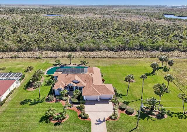 Property at 1145 Boundary Blvd, Rotonda West, FL 33947, 3 beds, 3.5 baths