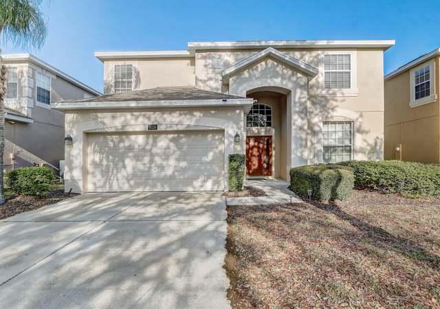 Property at 1028 Orange Cosmos Blvd, Davenport, FL 33837, 6 beds, 4.5 baths