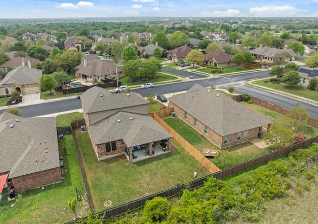 Property at 30336 Tiger Woods Dr, Georgetown, TX 78628, 5 beds, 3 baths