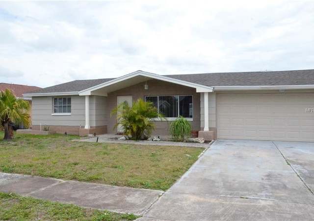 Property at 1118 Lodestar Dr, Holiday, FL 34690, 3 beds, 2.5 baths