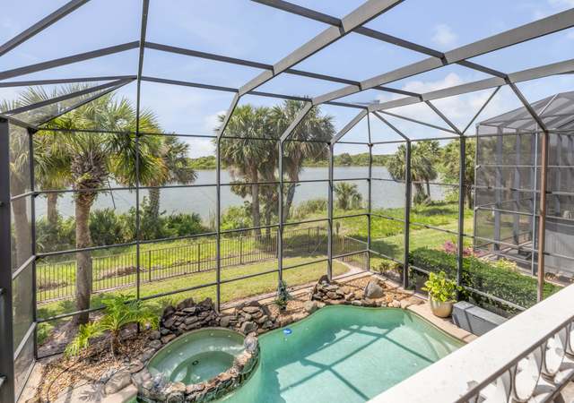Property at 100 Emerald Lake Dr, Palm Coast, FL 32137, 4 beds, 3.5 baths
