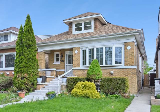 Property at 5814 W Roscoe St, Chicago, IL 60634, 5 beds, 3 baths