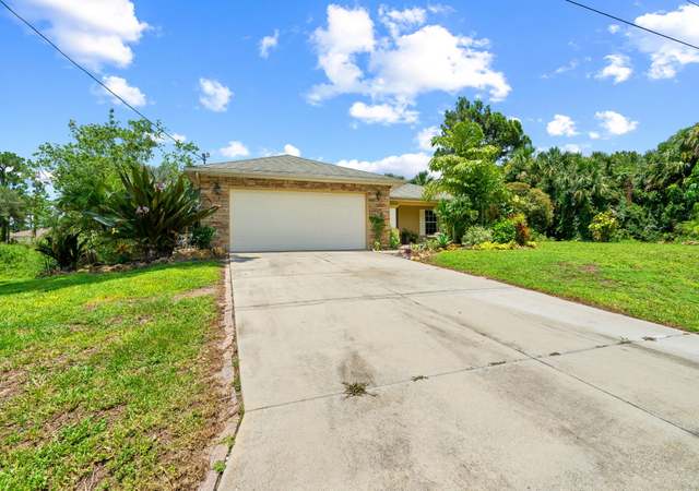 Property at 873 Spaulding St E, Lehigh Acres, FL 33974, 3 beds, 2 baths