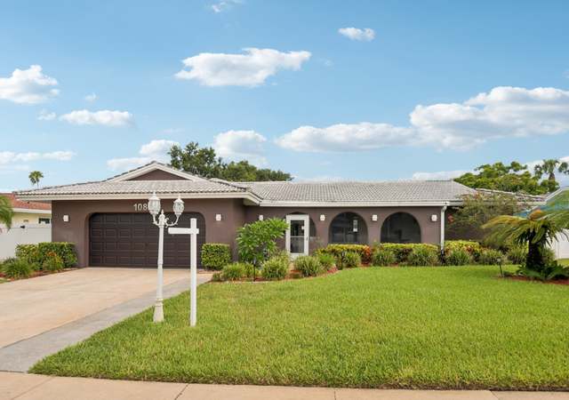 Property at 1080 Mccarty St, Dunedin, FL 34698, 4 beds, 3 baths