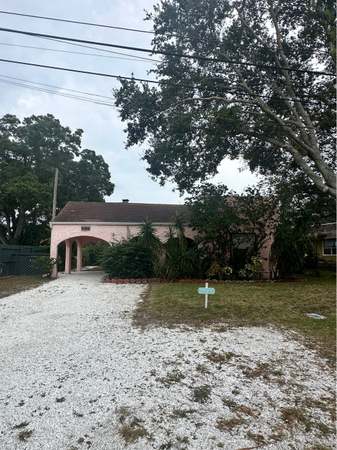 Property at 1154 7th St NW, Largo, FL 33770, 4 beds, 3 baths