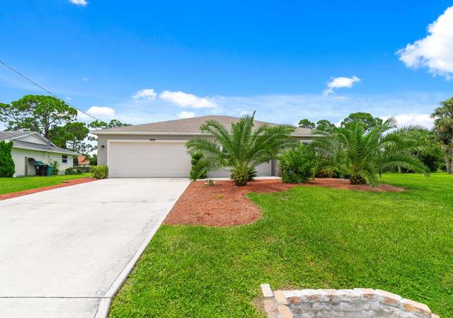 Photo of 1718 SW Carolina St, Port Saint Lucie, FL 34953