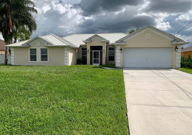 Property at 409 Windermere Dr, Lehigh Acres, FL 33972, 4 beds, 2 baths