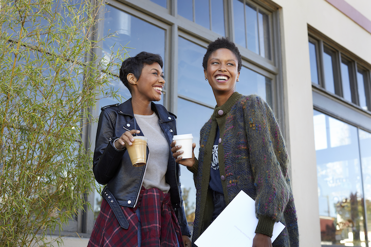 couple laughing with coffee